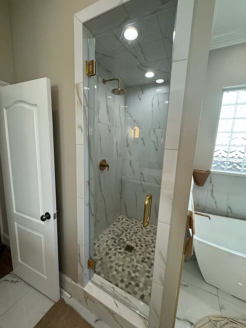 Glass-enclosed shower