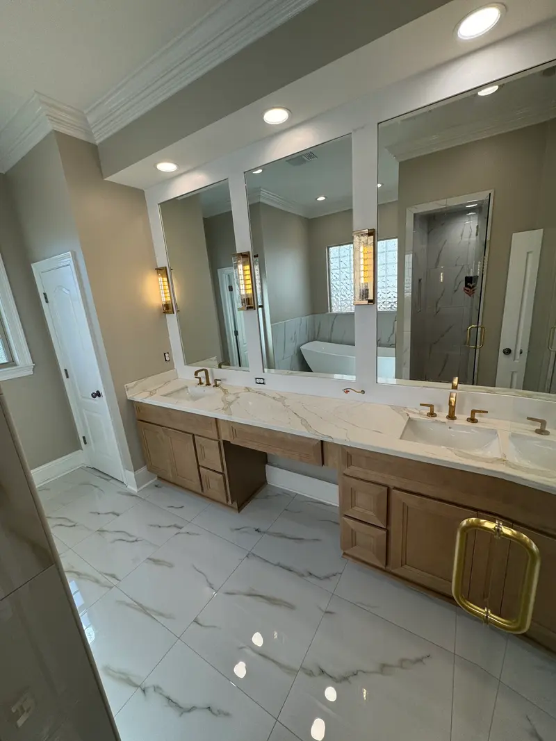 Bathroom vanity with brass fixtures