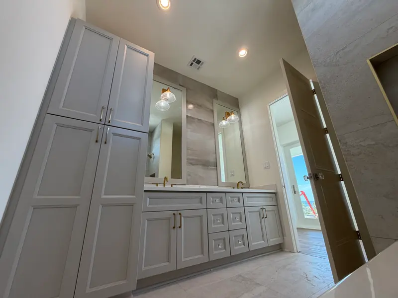 Gray vanity with stone top