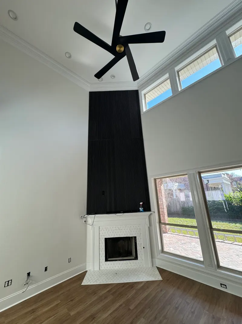 Living room with a dark fireplace surround