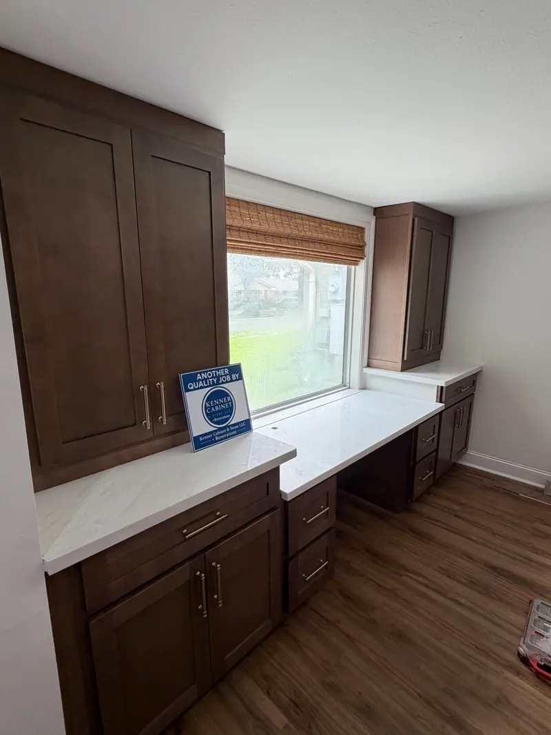 Kitchen flowing into the next room