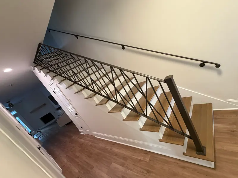Staircase with new railing and wood treads