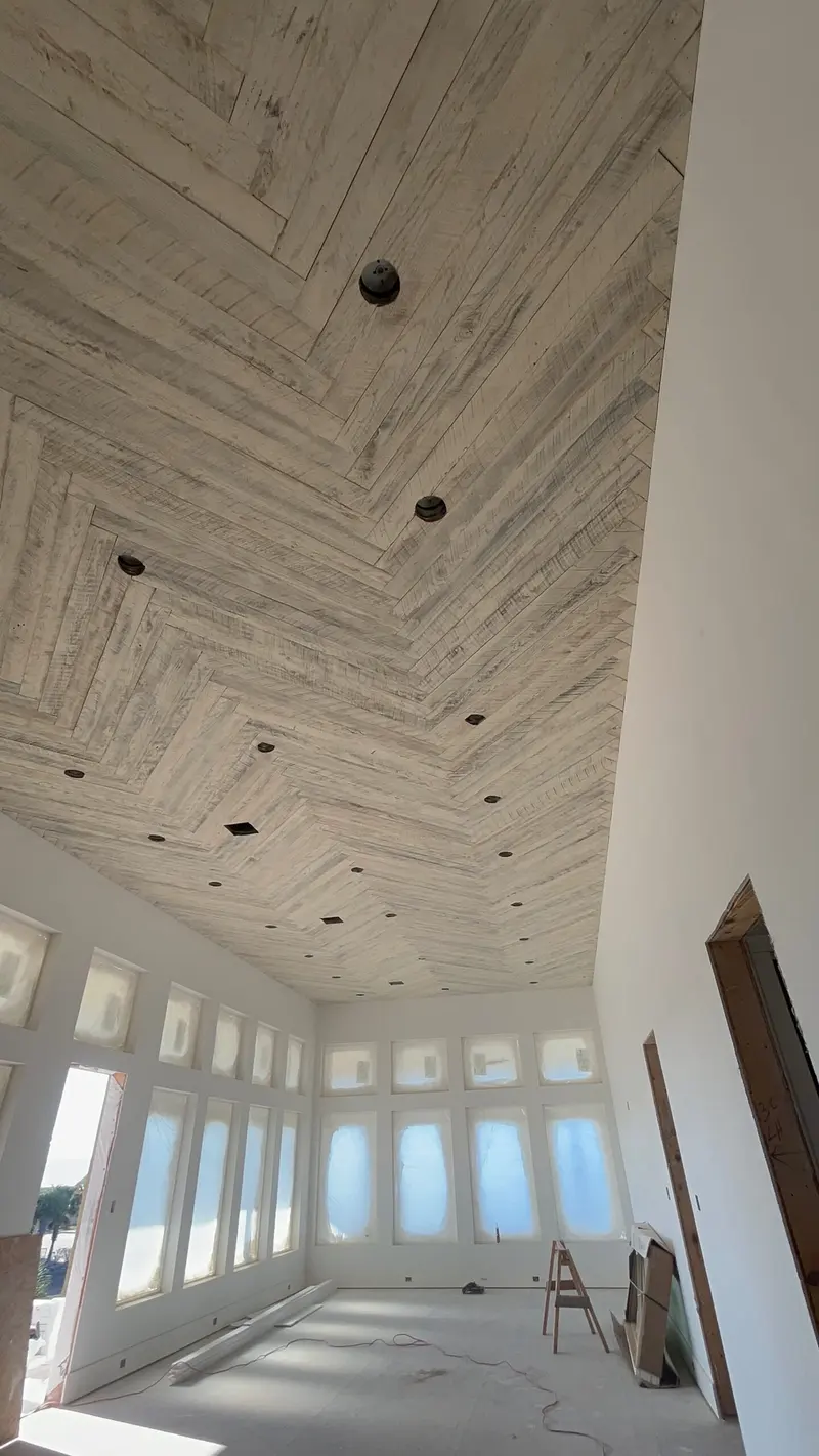 Wood-plank ceiling with beams