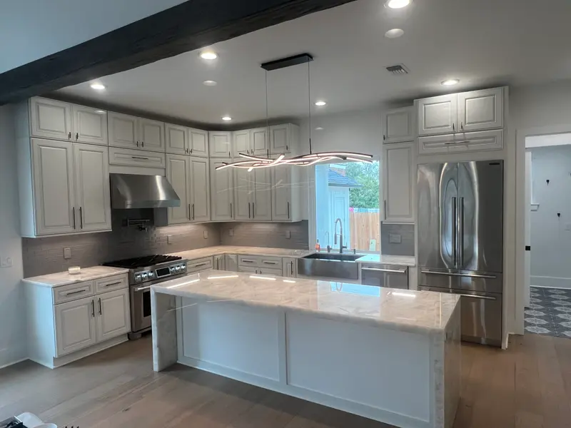 Kitchen with a dark island