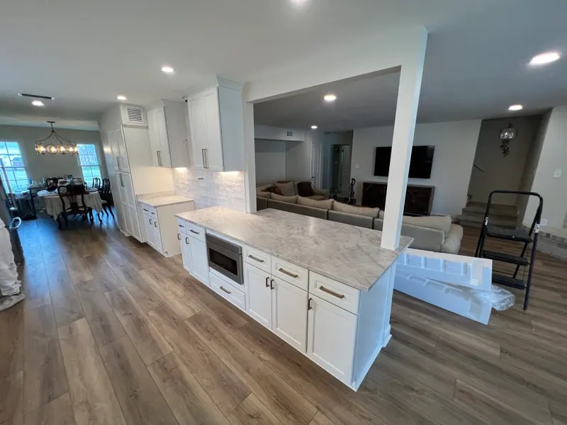 Open living area connected to a remodeled kitchen